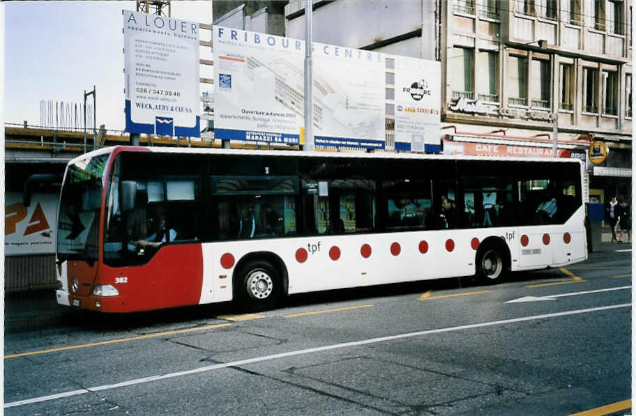 (052'437) - TPF Fribourg - Nr. 382/FR 300'383 - Mercedes am 17. M�rz 2002 beim Bahnhof Fribourg