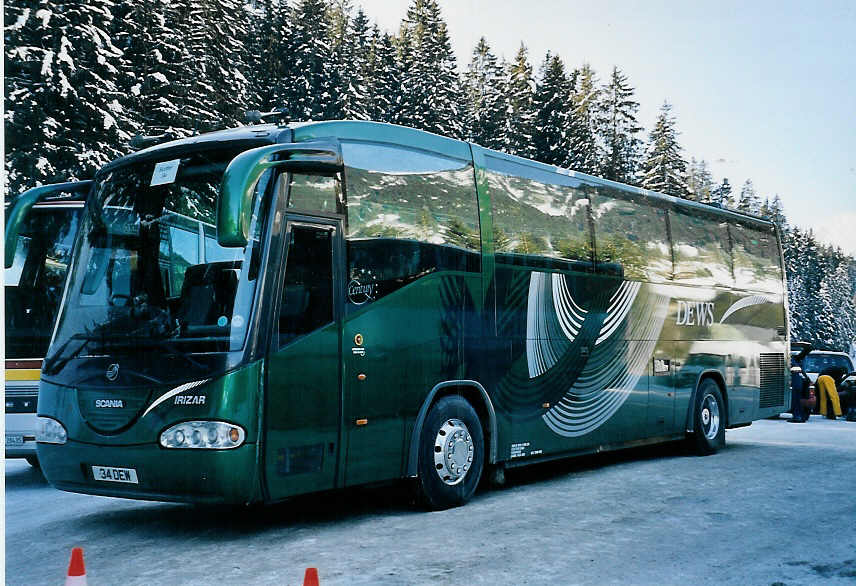 (058'727) - Aus England: Dews, Somersham - 34 DEW - Scania/Irizar am 18. Februar 2003 in Adelboden, ASB