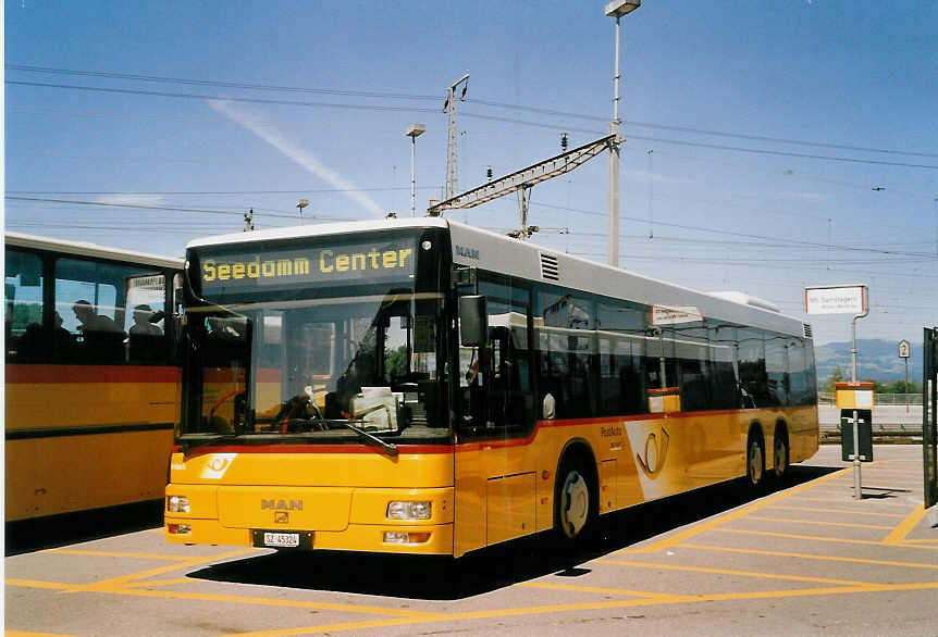 (061'030) - Schuler, Feusisberg - SZ 45'324 - MAN am 21. Juni 2003 beim Bahnhof Pf�ffikon