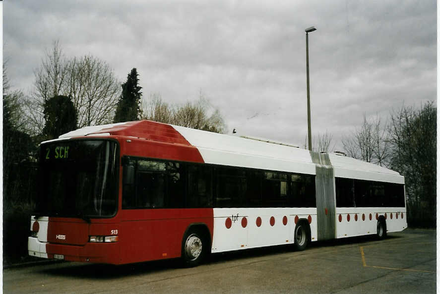 (066'115) - TPF Fribourg - Nr. 513/FR 300'391 - MAN/Hess Gelenkduobus am 21. M�rz 2004 in Fribourg, Garage