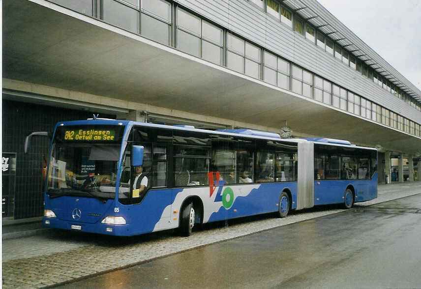 (068'431) - VZO Gr�ningen - Nr. 65/ZH 494'065 - Mercedes am 19. Juni 2004 beim Bahnhof Uster