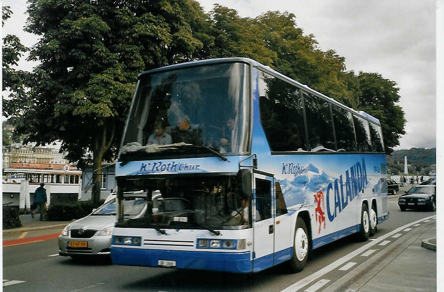 (070'122) - Roth, Chur - GR 1666 - Dr�gm�ller am 21. August 2004 beim Bahnhof Luzern