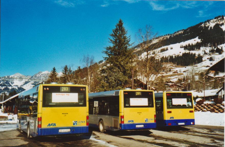 (113'319) - AFA Adelboden - Nr. 55/BE 611'055 + Nr. 56/BE 611'030 - MAN/G�ppel + Nr. 53/BE 611'224 - Mercedes (ex VAG D-Freiburg Nr. 825) am 24. Dezember 2008 beim Bahnhof Lenk
