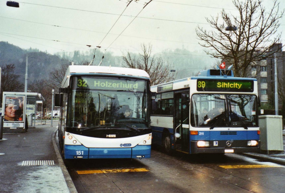 (123'013) - VBZ Z�rich - Nr. 151 - Hess/Hess Gelenktrolleybus + Nr. 211/ZH 588'211 - Mercedes am 13. November 2009 in Z�rich, Strassenverkehrsamt