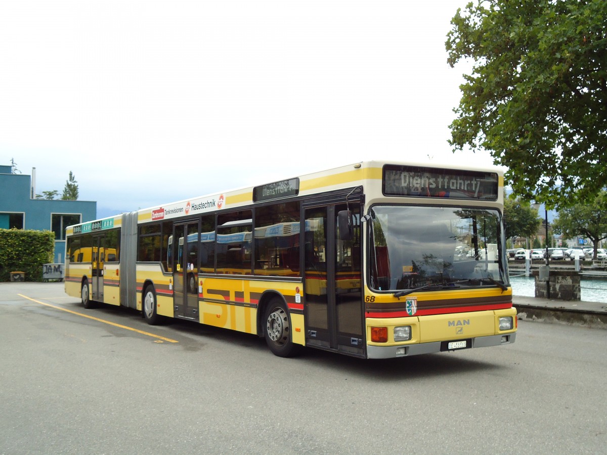 (128'015) - STI Thun - Nr. 68/BE 458'568 - MAN am 24. Juli 2010 bei der Schiffl�ndte Thun
