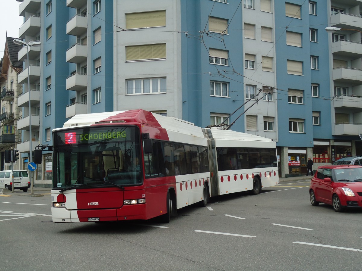 (132'704) - TPF Fribourg - Nr. 520/FR 300'435 - MAN/Hess Gelenkduobus am 7. M�rz 2011 in Fribourg, Avenue Beauregard