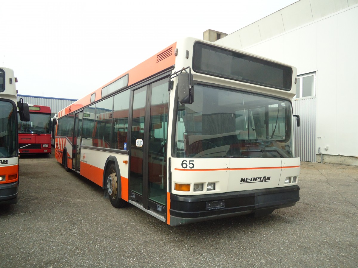 (137'018) - RATP, Satigny - Nr. 65 - Neoplan (ex Dupraz, Gen�ve Nr. 65) am 26. November 2011 in Biel, Rattinbus