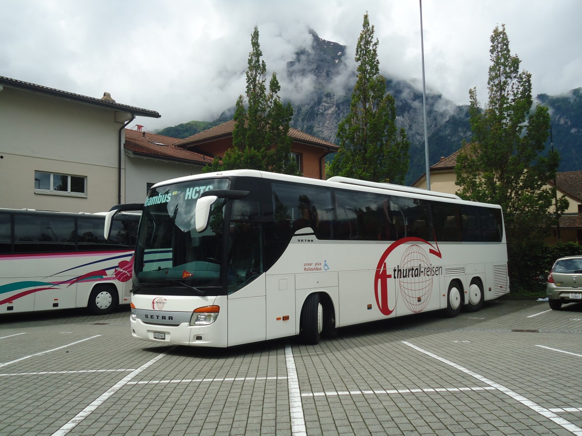 (139'421) - Thurtal-Reisen, Kefikon - TG 167'641 - Setra am 11. Juni 2012 beim Bahnhof Fl�elen