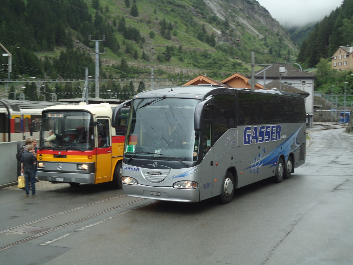 (140'374) - Gasser, Altdorf - UR 9290 - Scania/Irizar am 1. Juli 2012 beim Bahnhof G�schenen