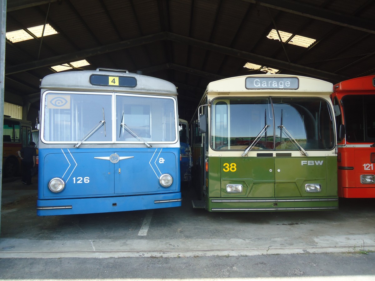 (141'277) - ACT Lugano (TVS) - Nr. 126 - FBW/Hess Trolleybus (ex RhV Altst�tten Nr. 6) + SVB Bern (TVS) - Nr. 38 - FBW/R&J Gelenktrolleybus am 19. August 2012 in Yvonand, Halle TVS