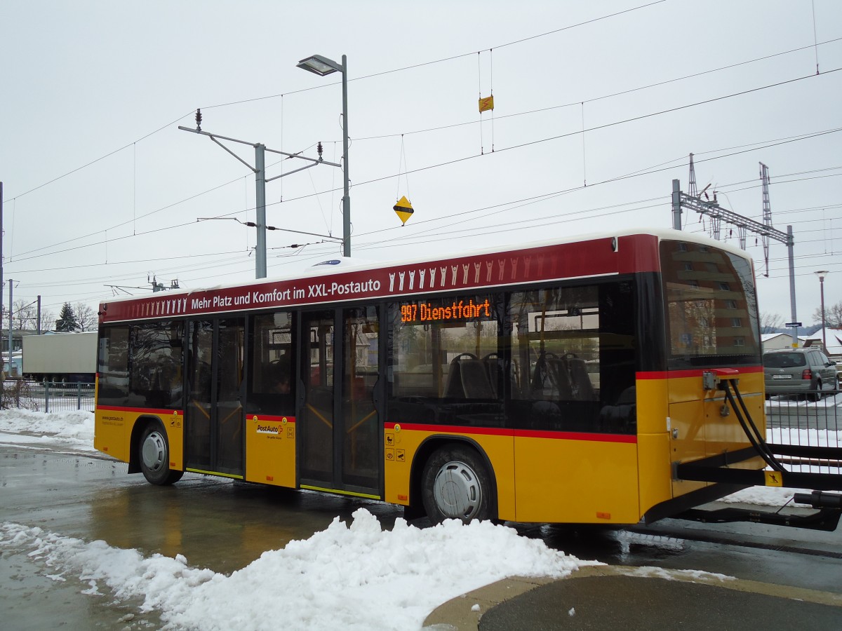 (143'104) - Klopfstein, Laupen - BE 193'594 - Lanz+Marti/Hess Personenanh�nger am 21. Januar 2013 beim Bahnhof D�dingen