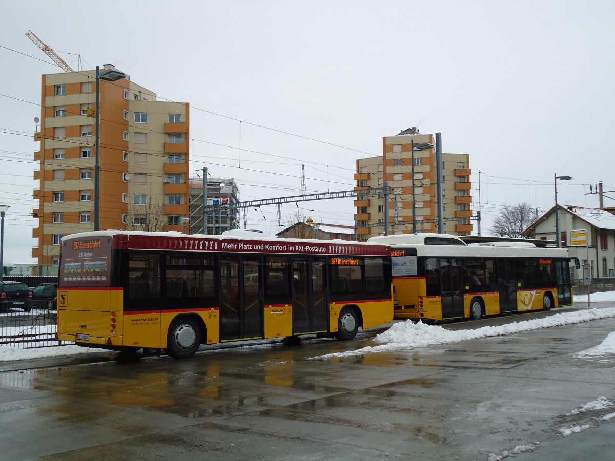 (143'105) - Klopfstein, Laupen - BE 193'594 - Lanz+Marti/Hess Personenanh�nger am 21. Januar 2013 beim Bahnhof D�dingen