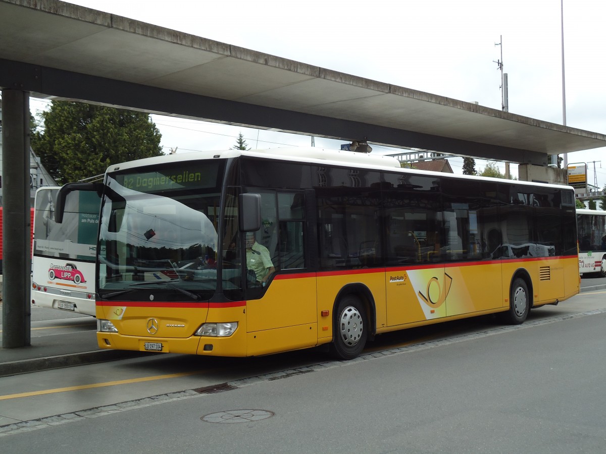 (144'931) - H�fliger, Sursee - Nr. 4/LU 197'104 - Mercedes (ex PostAuto Nordschweiz Nr. 4) am 10. Juni 2013 beim Bahnhof Sursee