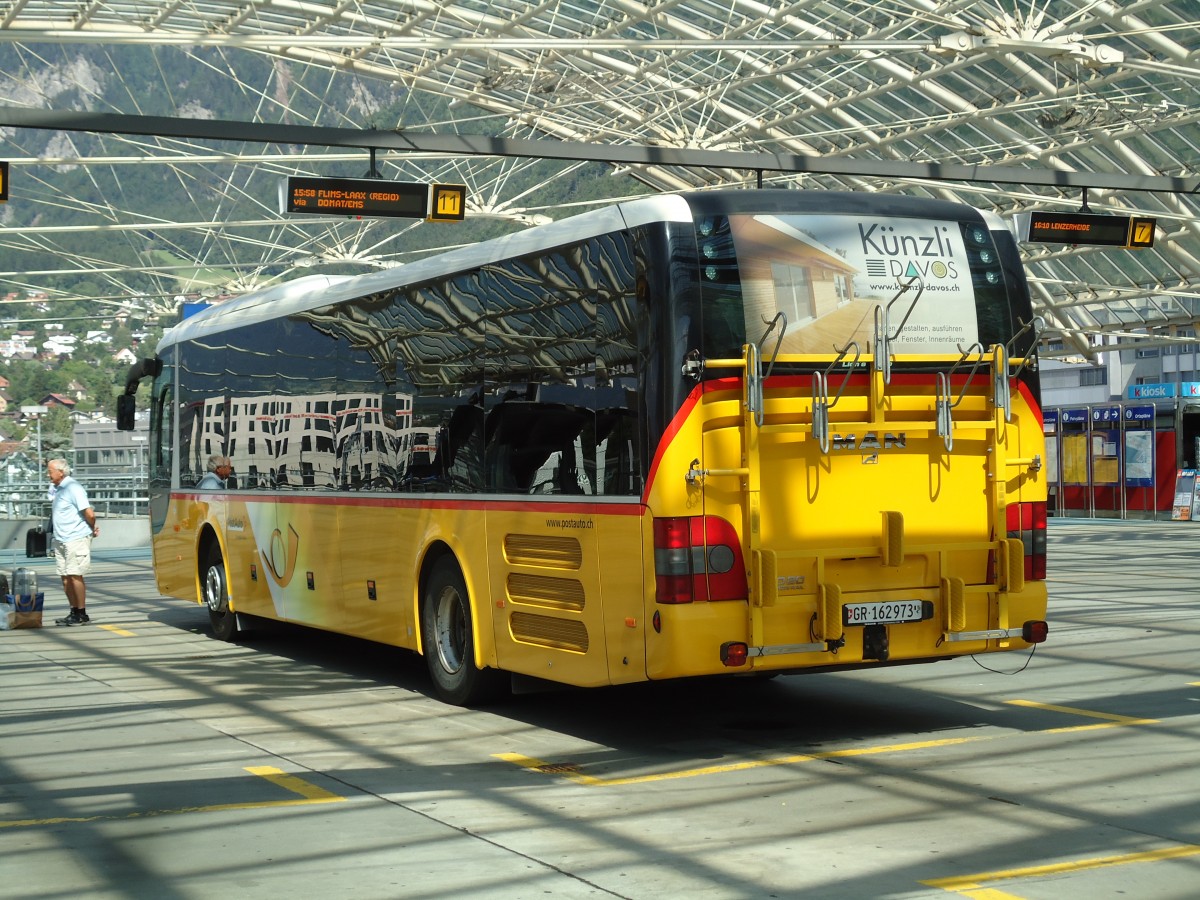 (145'270) - PostAuto Graub�nden - GR 162'973 - MAN am 17. Juni 2013 in Chur, Postautostation