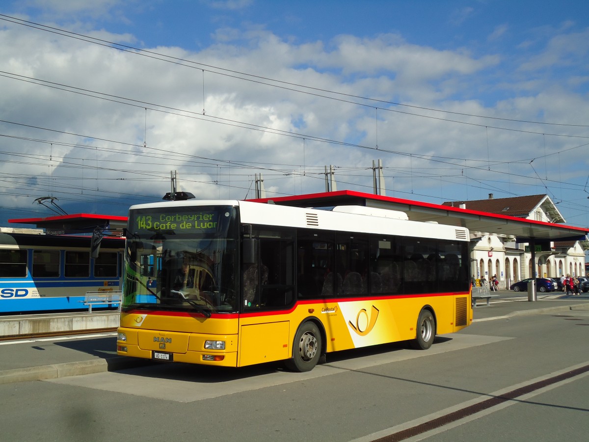 (145'316) - TPC Aigle - VD 1174 - MAN/G�ppel am 22. Juni 2013 beim Bahnhof Aigle