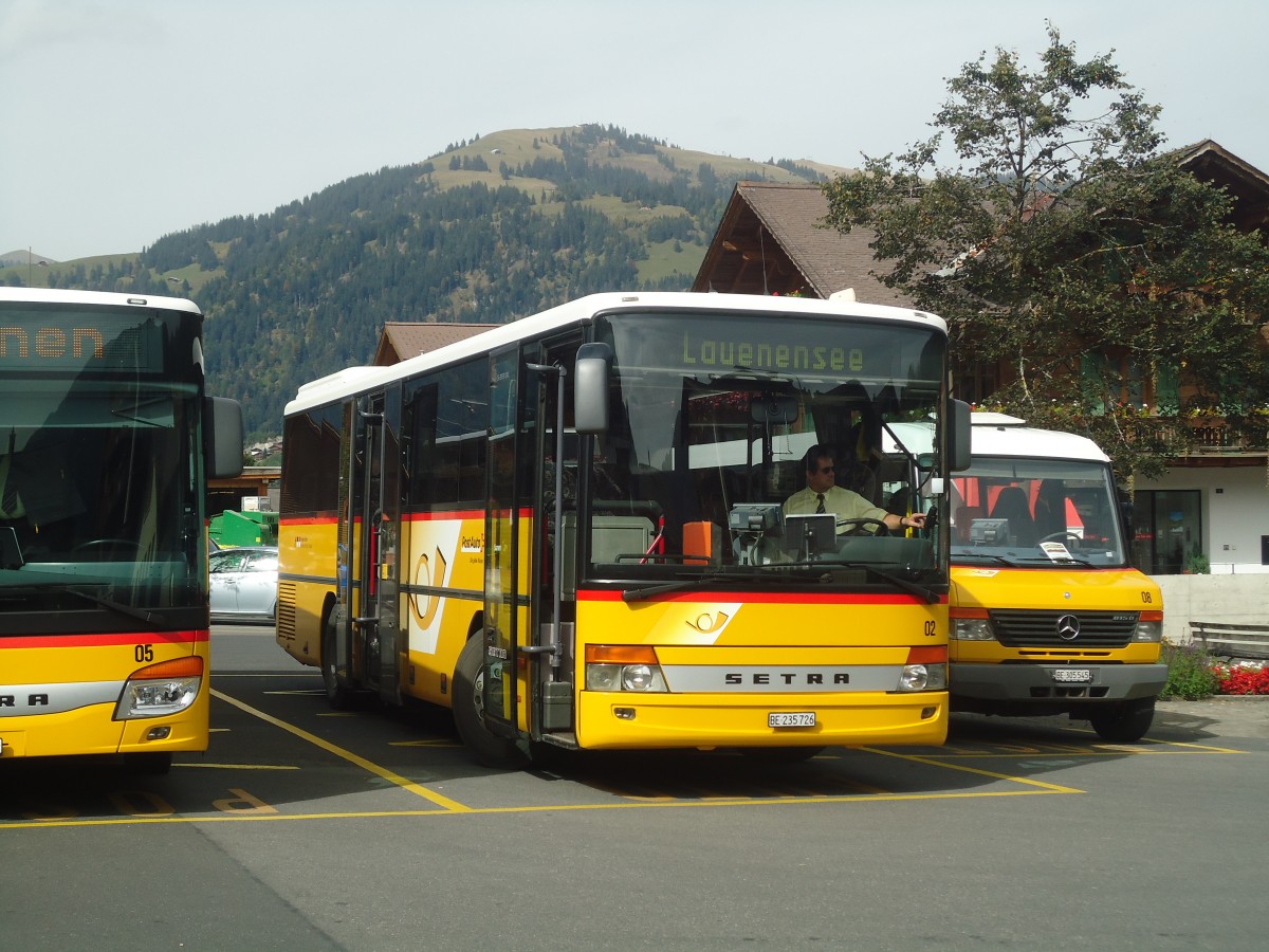 (147'394) - K�bli, Gstaad - Nr. 2/BE 235'726 - Setra am 28. September 2013 beim Bahnhof Gstaad