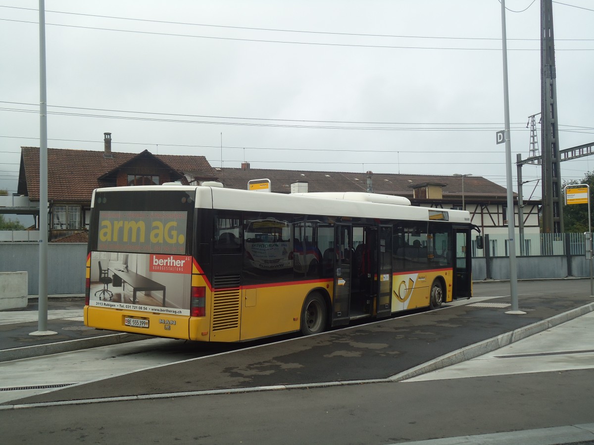 (147'432) - Lengacher, M�nsingen - Nr. 1/BE 555'399 - MAN am 30. September 2013 beim Bahnhof M�nsingen