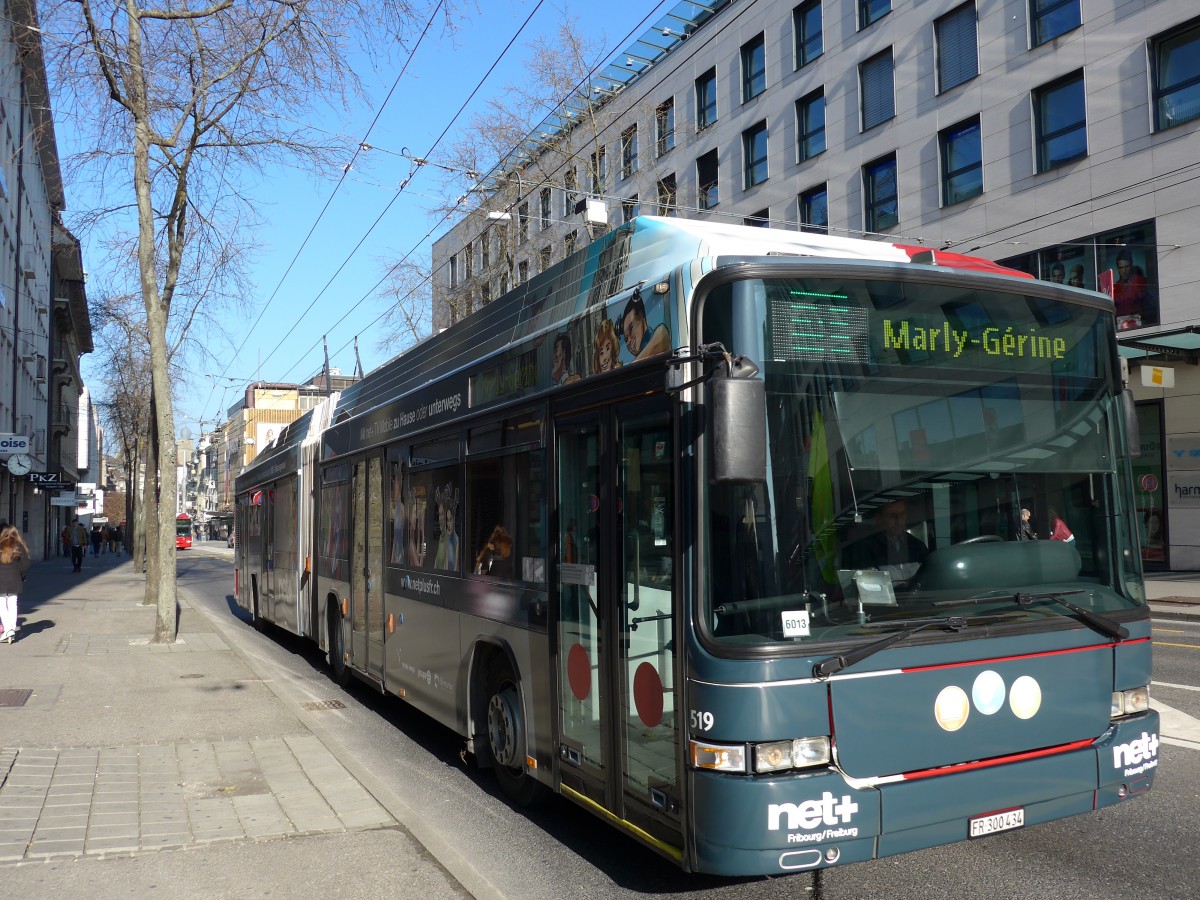 (149'283) - TPF Fribourg - Nr. 519/FR 300'434 - MAN/Hess Gelenkduobus am 9. M�rz 2014 beim Bahnhof Fribourg