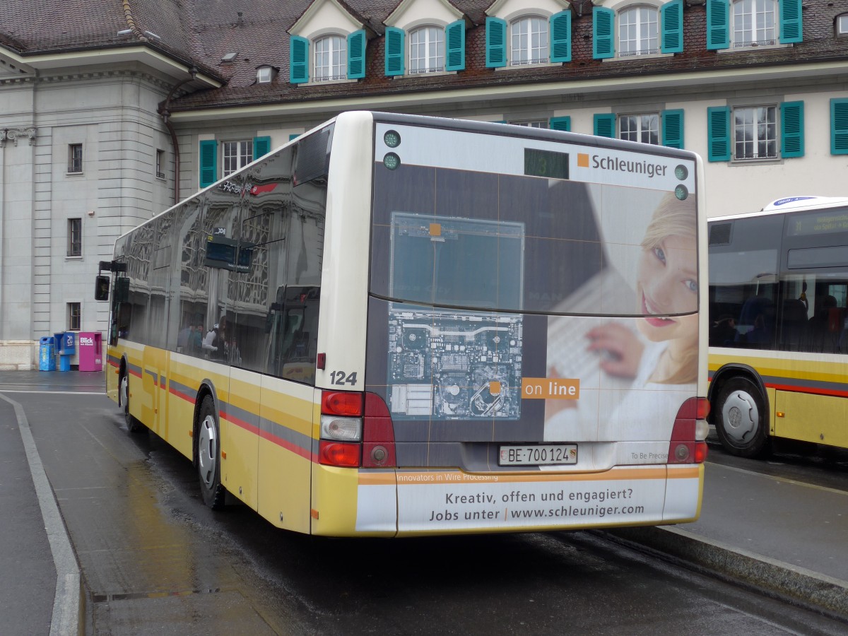 (149'391) - STI Thun - Nr. 124/BE 700'124 - MAN am 23. M�rz 2014 beim Bahnhof Thun