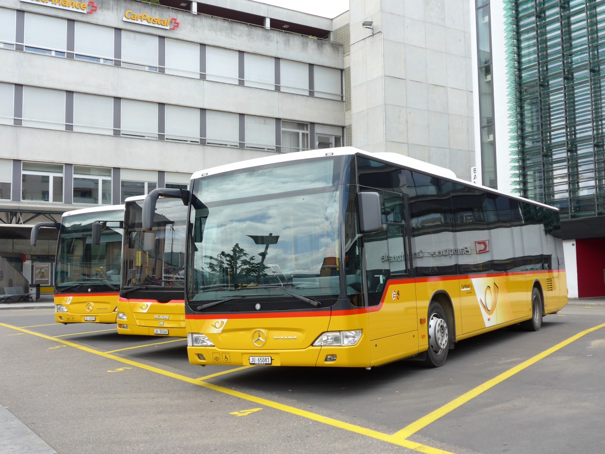 (151'050) - CarPostal Ouest - Nr. 14/JU 65'081 - Mercedes am 29. Mai 2014 in Del�mont, Place de la Poste