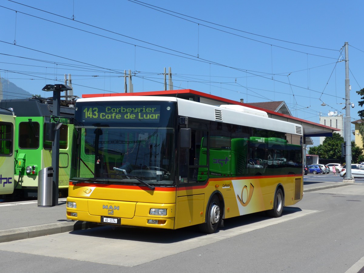 (151'715) - TPC Aigle - VD 1174 - MAN/G�ppel am 21. Juni 2014 beim Bahnhof Aigle