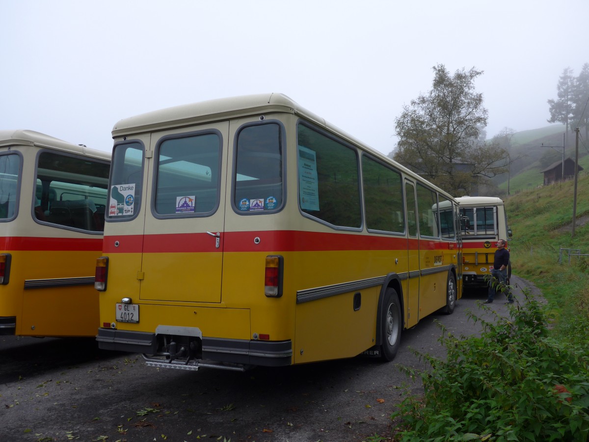 (155'605) - Schmid, Glarus - GL 4012 - Saurer/T�scher (ex Mosimann, Aesch; ex Erne, Full; ex P 24'257) am 12. Oktober 2014 in K�ssnacht, Rest. Frohsinn