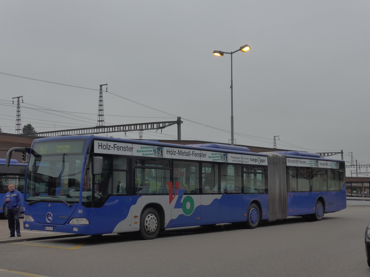 (157'542) - VZO Gr�ningen - Nr. 65/ZH 494'065 - Mercedes am 26. November 2014 beim Bahnhof Wetzikon