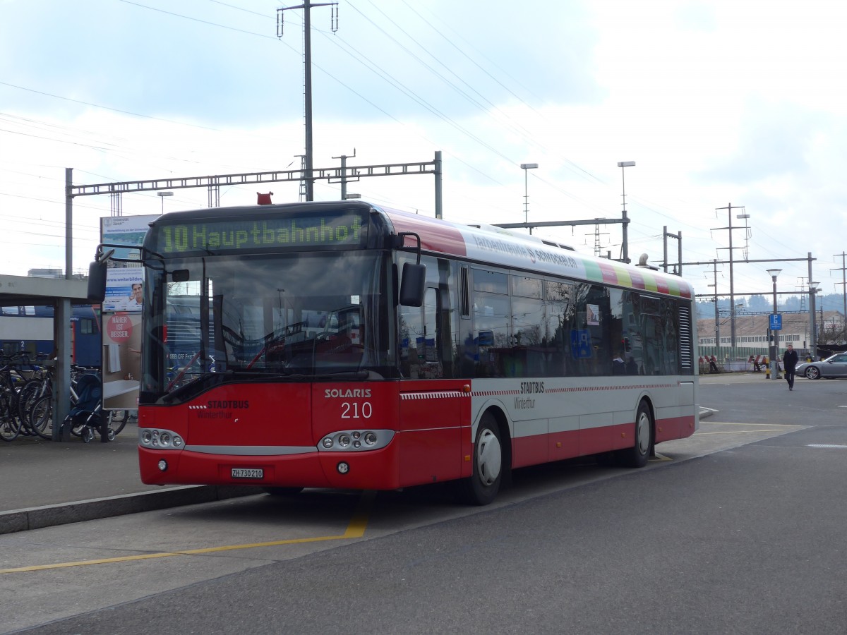 (159'448) - SW Winterthur - Nr. 210/ZH 730'210 - Solaris am 27. M�rz 2015 beim Bahnhof Oberwinterthur
