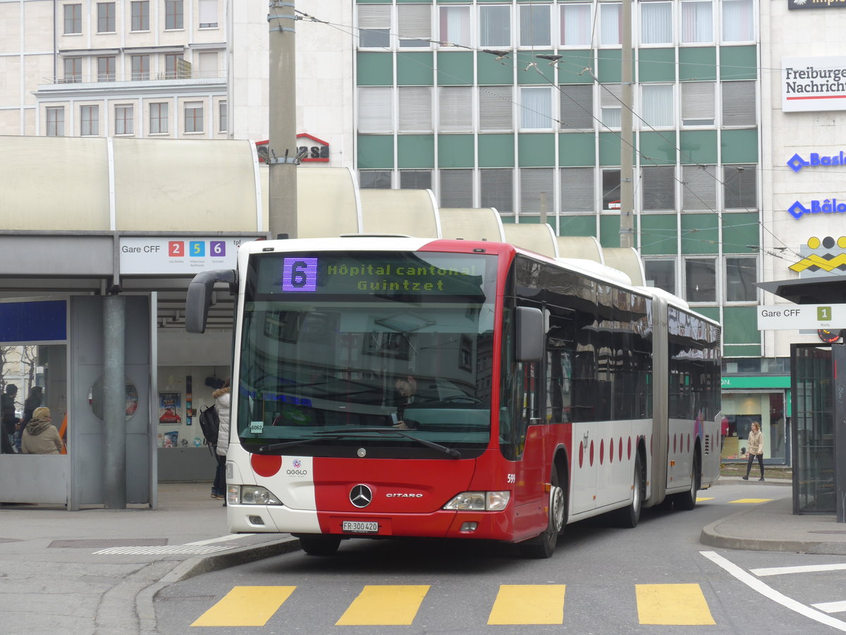 (169'236) - TPF Fribourg - Nr. 599/FR 300'420 - Mercedes am 13. M�rz 2016 beim Bahnhof Fribourg