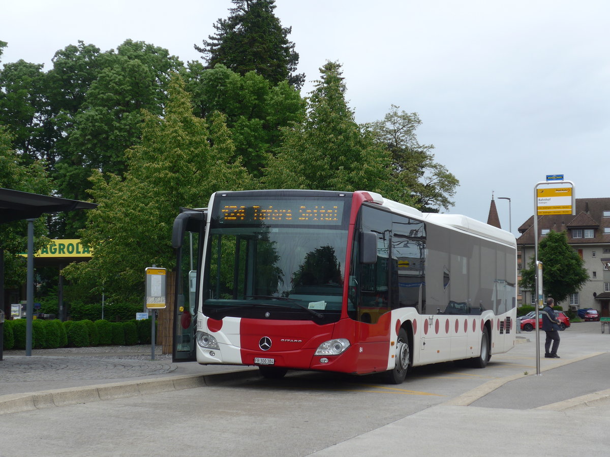 (171'777) - TPF Fribourg - Nr. 84/FR 300'384 - Mercedes am 13. Juni 2016 beim Bahnhof D�dingen