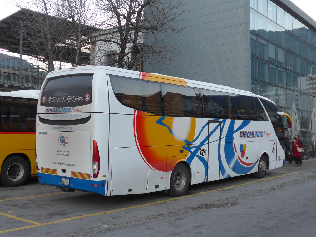 (176'855) - Giromundo, Z�rich - ZH 691'924 - MAN/Atomic am 4. Dezember 2016 beim Bahnhof Brig