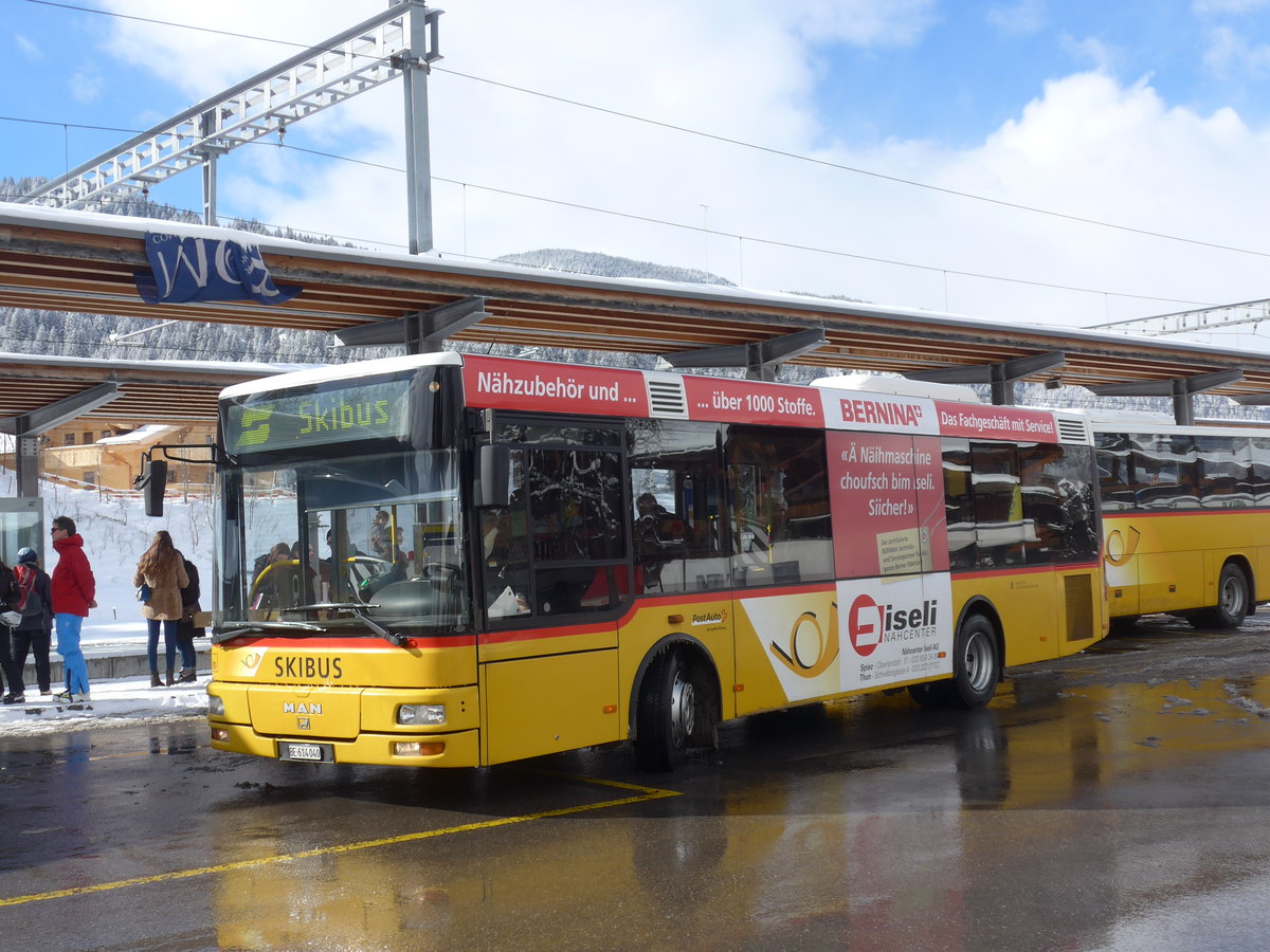 (188'476) - AVG Meiringen - Nr. 72/BE 614'040 - MAN/G�ppel am 12. Februar 2018 beim Bahnhof Gstaad (Einsatz PostAuto)