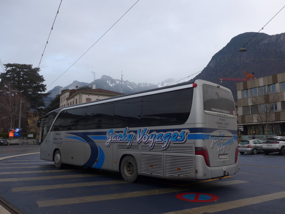 (188'977) - Jacky Voyages, Ch�teau-d'Oex - VD 735 - Setra am 3. M�rz 2018 beim Bahnhof Aigle