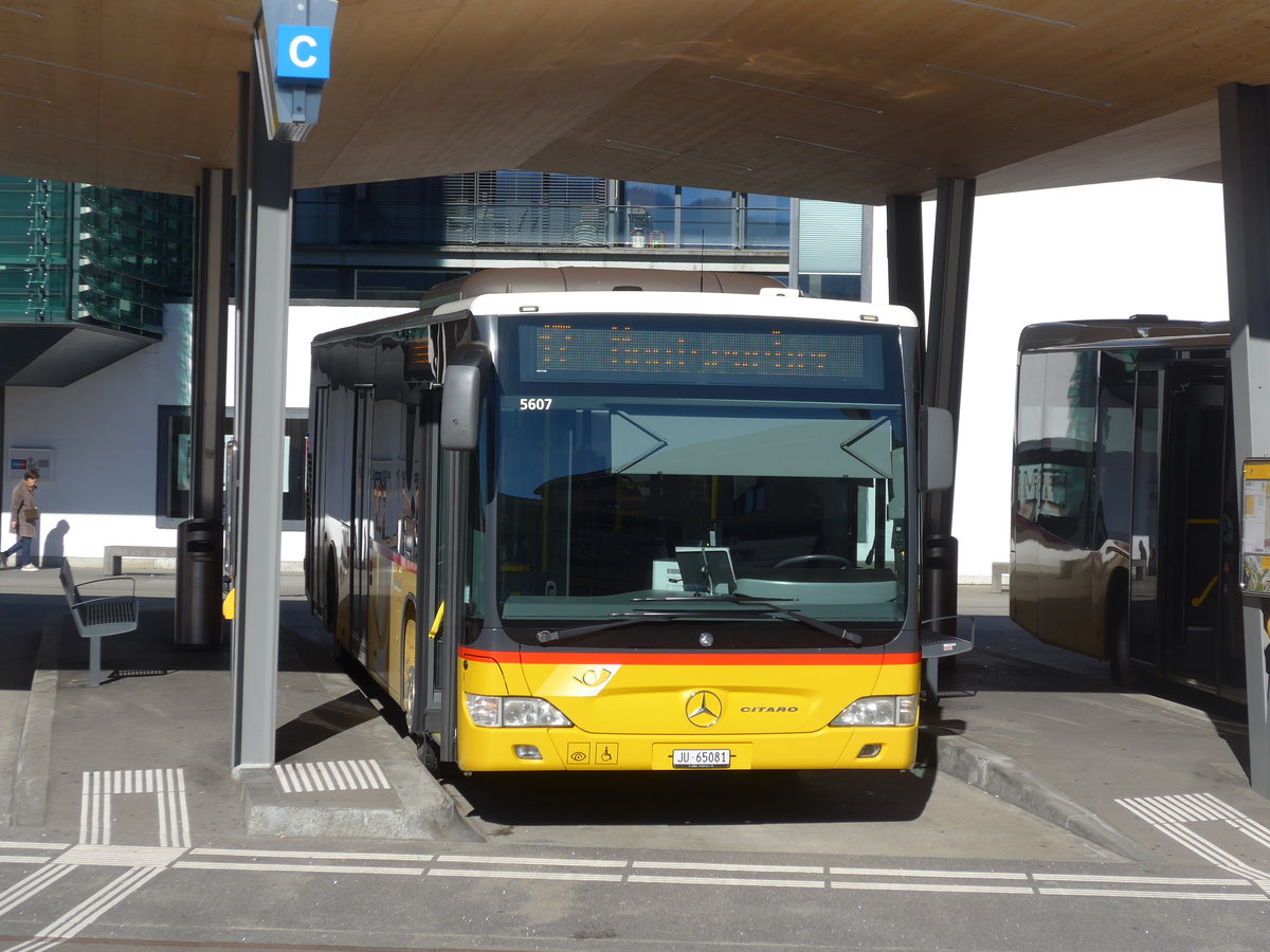 (201'602) - CarPostal Ouest JU 65'081 - Mercedes (ex Nr. 14) am 16. Februar 2019 beim Bahnhof Del�mont