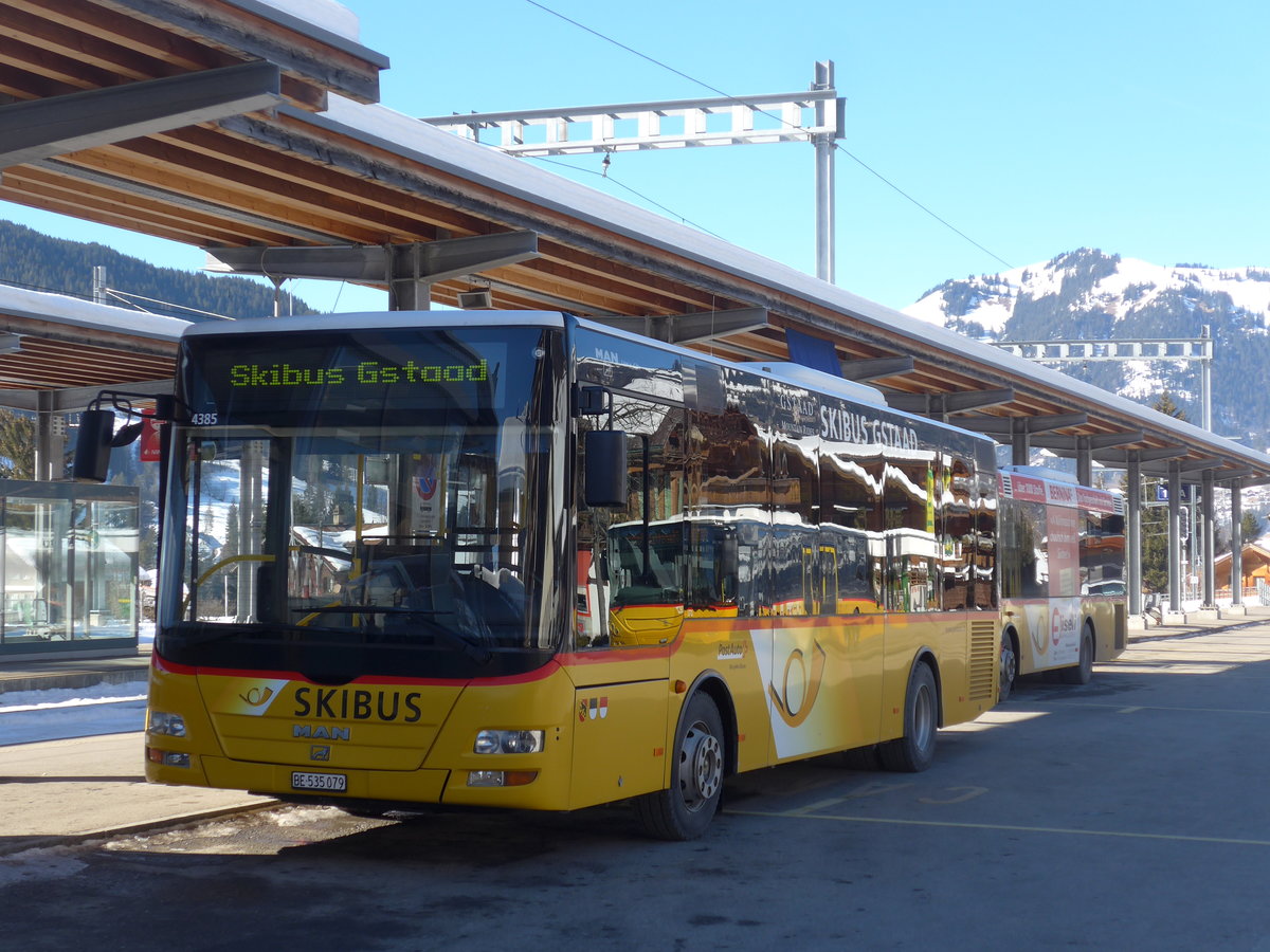 (201'689) - PostAuto Bern - BE 535'079 - MAN/G�ppel (ex Nr. 217; ex RBS Worblaufen Nr. 217) am 17. Februar 2019 beim Bahnhof Gstaad
