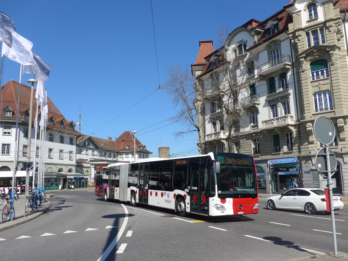 (203'233) - TPF Fribourg - Nr. 557/FR 300'413 - Mercedes am 24. M�rz 2019 beim Bahnhof Fribourg