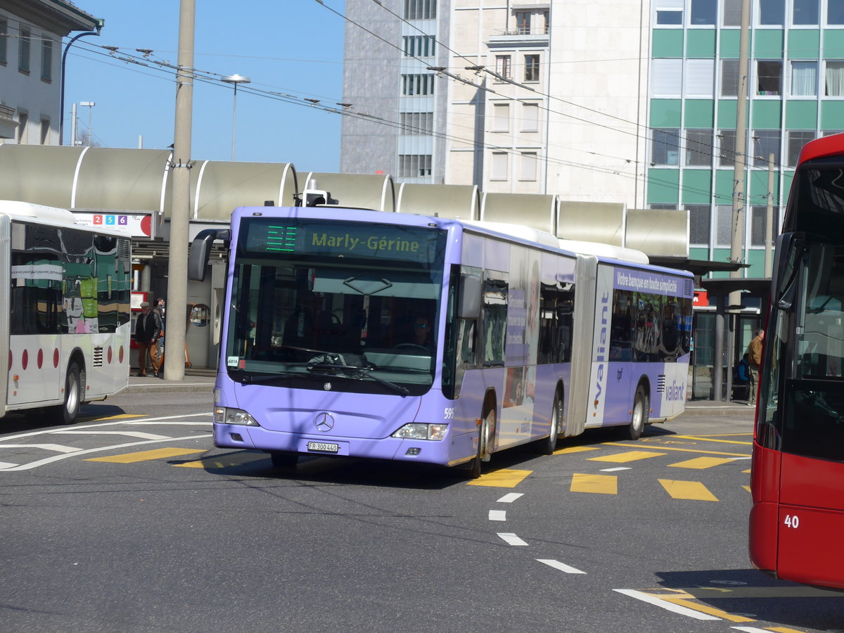 (203'250) - TPF Fribourg - Nr. 595/FR 300'440 - Mercedes am 24. M�rz 2019 beim Bahnhof Fribourg