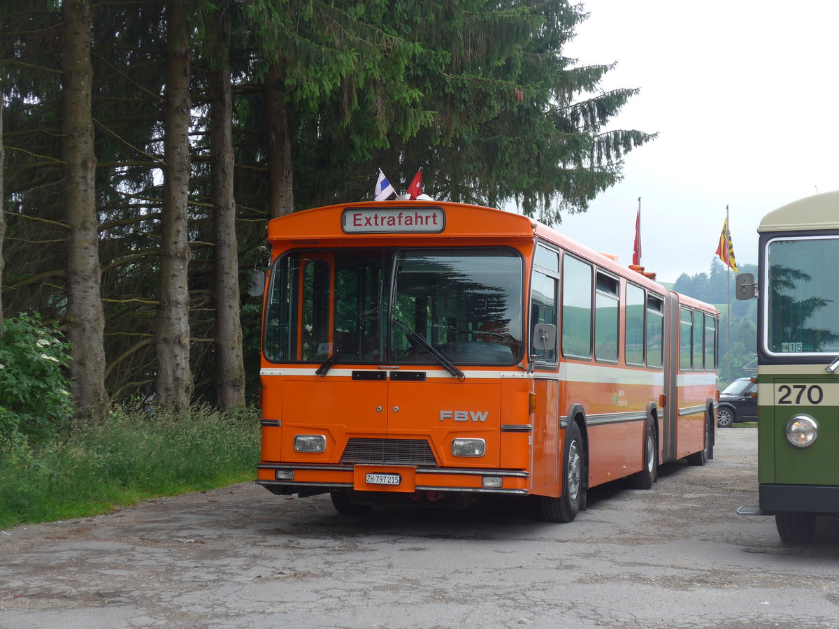 (206'476) - ZVB Zug (RWB) - Nr. 35/ZH 797'215 - FBW/Hess am 22. Juni 2019 beim Bahnhof H�swil