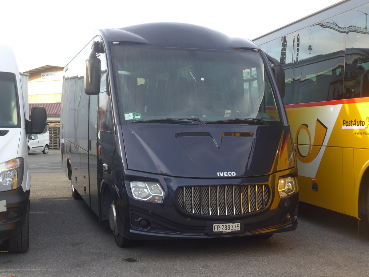 (214'236) - Busmiete, M�nchenstein - FR 288'335 - Iveco/Sitcar am 16. Februar 2020 in Kerzers, Interbus