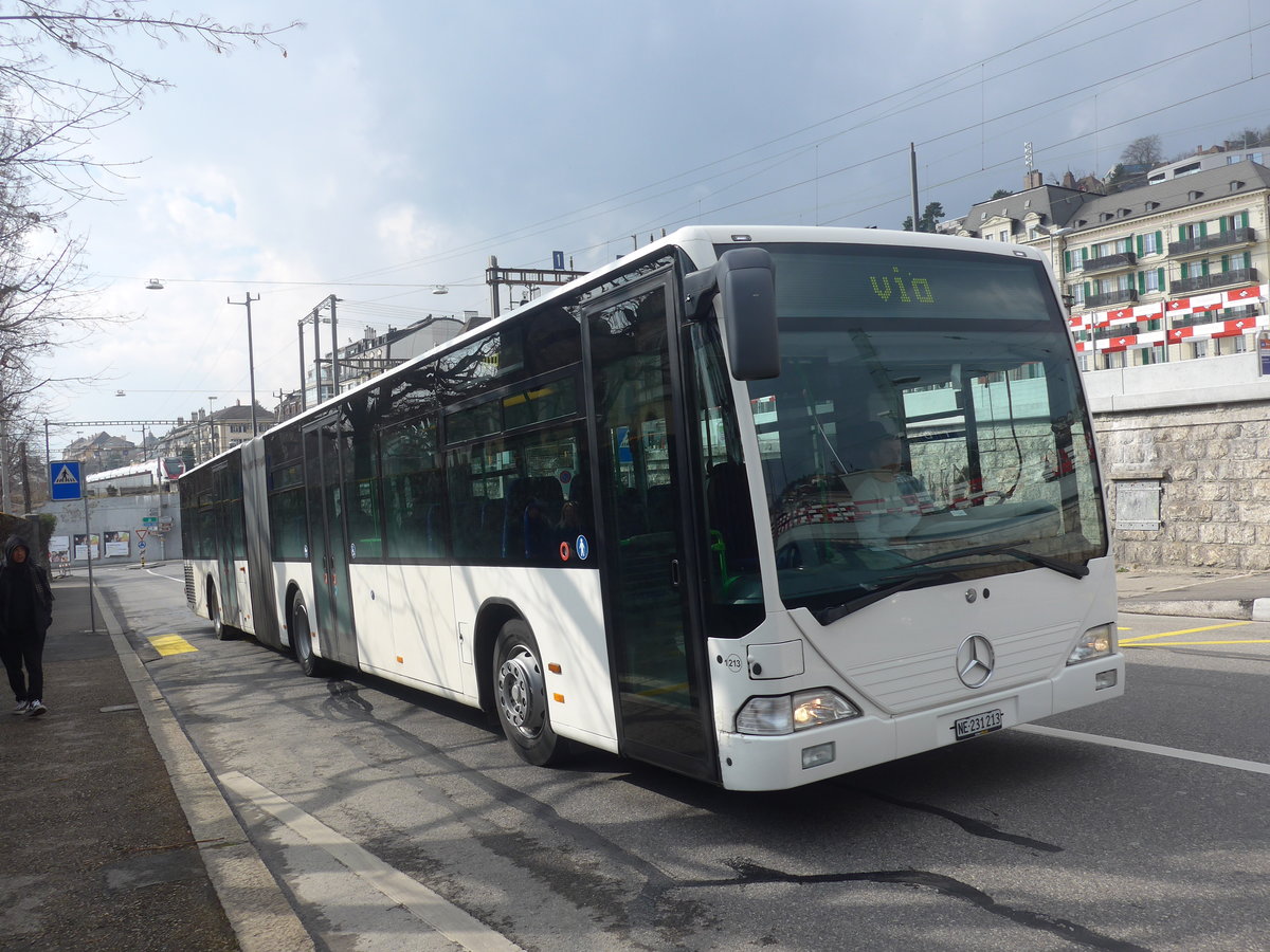 (224'042) - Interbus, Yverdon - Nr. 1213/NE 231'213 - Mercedes (ex BVB Basel Nr. 791; ex Knecht, Windisch; ex AAGS Schwyz Nr. 84; ex VR La Chaux-de-Fonds Nr. 228) am 7. M�rz 2021 beim Bahnhof Neuch�tel (Einsatz CarPostal)