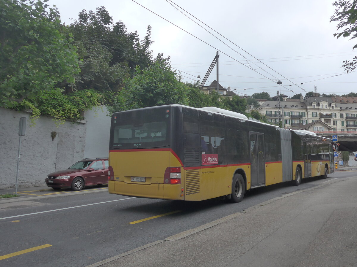 (226'924) - Buchard, Leytron - NE 165'374 - MAN (ex VS 141'737; ex Nr. 158) am 1. August 2021 in Neuch�tel, Avenue de la Gare (Einsatz CarPostal)