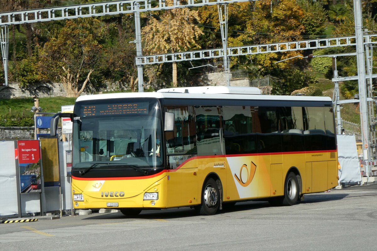 (230'312) - AutoPostale Ticin - TI 215'200 - Iveco (ex Vorf�hrfahrzeug) am 10. November 2021 beim Bahnhof Lugano