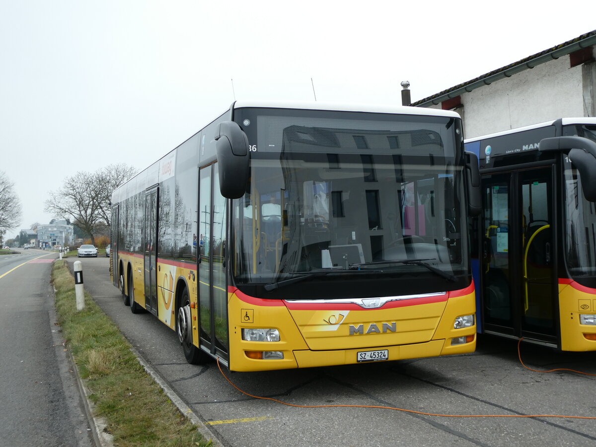 (230'850) - Lienert&Ehrler, Einsiedeln - SZ 45'324 - MAN (ex Schuler, Feusisberg) am 21. November 2021 in Pf�ffikon, Garage