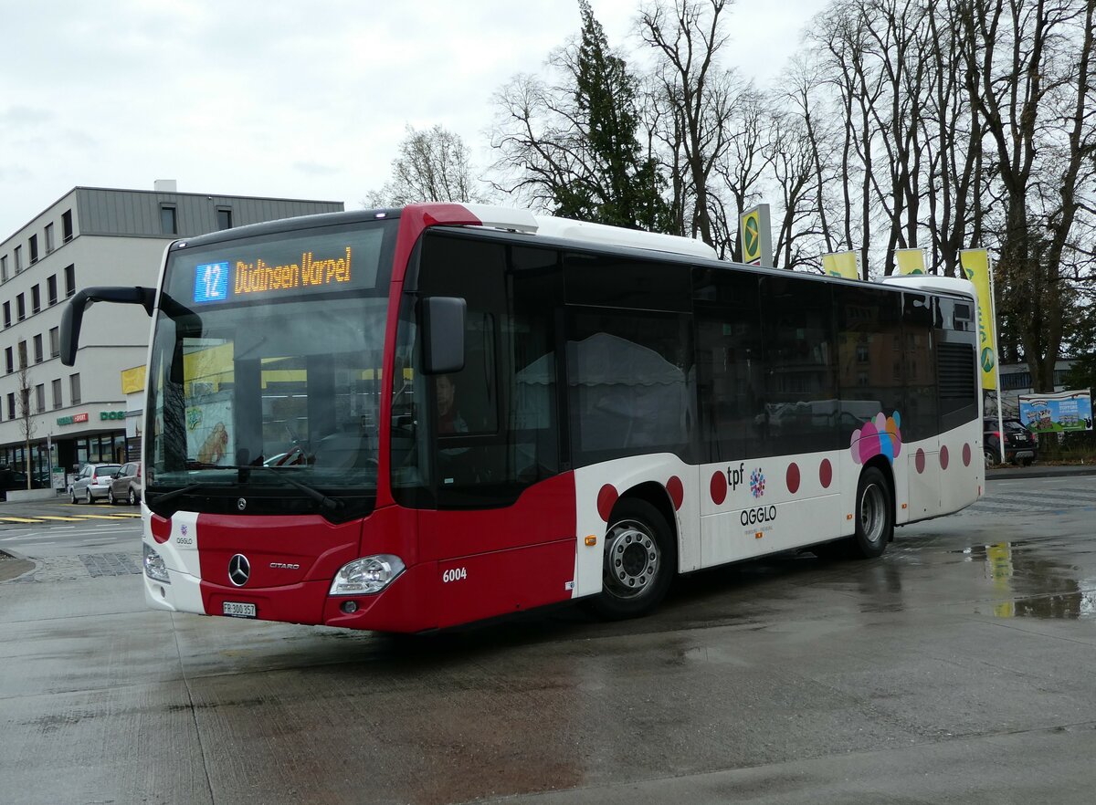 (234'228) - TPF Fribourg - Nr. 6004/FR 300'357 - Mercedes am 8. April 2022 beim Bahnhof D�dingen