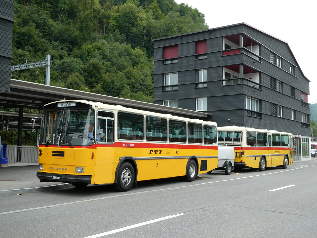 (239'822) - Schmid, Th�rishaus - BE 26'206 - Saurer/T�scher (ex P 24'244) am 28. August 2022 beim Bahnhof Giswil