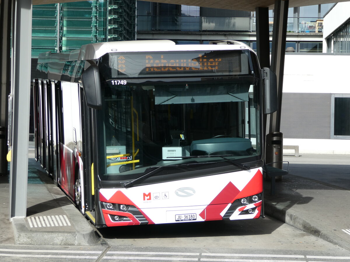 (241'948) - CarPostal Ouest - JU 36'180 - Solaris am 29. Oktober 2022 beim Bahnhof Del�mont