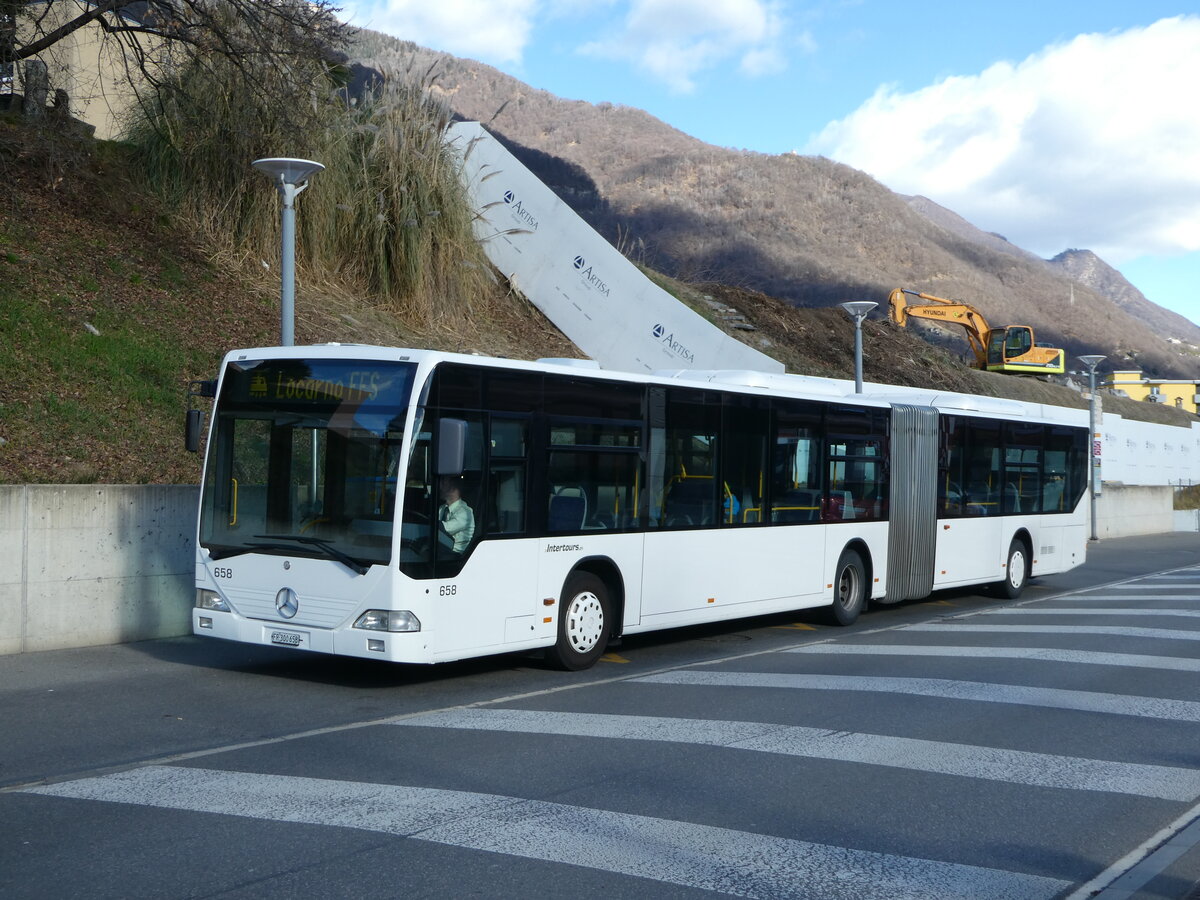 (245'820) - Intertours, Domdidier - Nr. 658/FR 300'658 - Mercedes (ex Nr. 206; ex VZO Gr�ningen Nr. 51) am 4. Februar 2023 beim Bahnhof Tenero