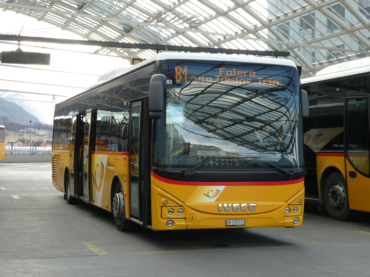 (246'553) - PostAuto Graub�nden - GR 179'713/PID 11'282 - Iveco am 24. Februar 2023 in Chur, Postautostation