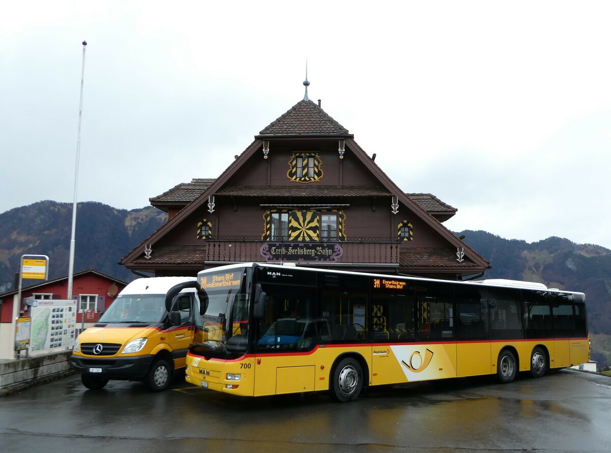 (247'110) - PostAuto Zentralschweiz - Nr. 700/NW 27'617/PID 5569 - MAN (ex Niederer, Filzbach Nr. 12; ex PostAuto Ostschweiz) am 10. M�rz 2023 beim Bahnhof Seelisberg