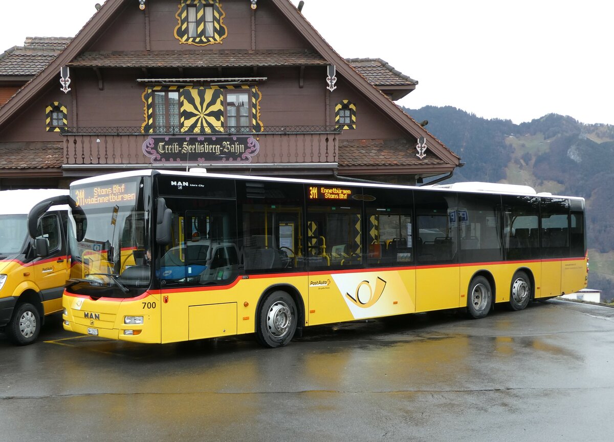 (247'111) - PostAuto Zentralschweiz - Nr. 700/NW 27'617/PID 5569 - MAN (ex Niederer, Filzbach Nr. 12; ex PostAuto Ostschweiz) am 10. M�rz 2023 beim Bahnhof Seelisberg